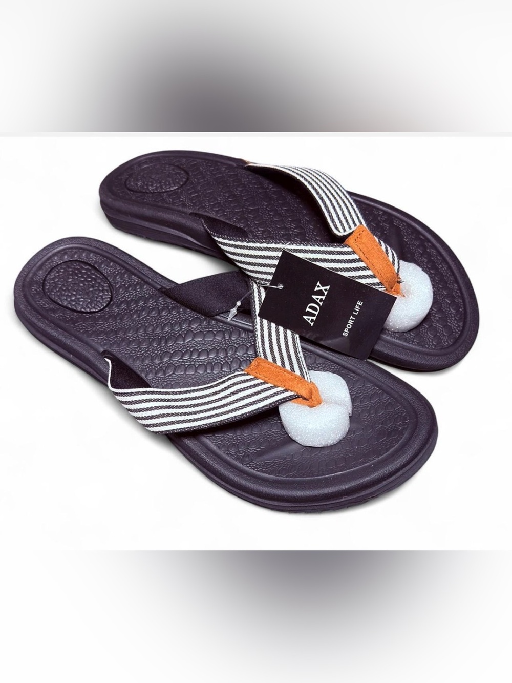 Adax Black and white striped flip flops